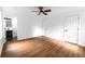 Large bedroom with hardwood floors and two closets, leading to the bath at 1111 Osborne Sw St, Atlanta, GA 30310