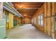 Unfinished basement with insulation and exposed ducts, presenting a blank canvas for your dream space at 1459 Hickory Branch Nw Trl, Kennesaw, GA 30152