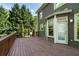Expansive rear deck off the home with wooded views and an exterior door at 1459 Hickory Branch Nw Trl, Kennesaw, GA 30152