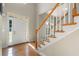 Bright entryway features hardwood floors, staircase, and plenty of natural light at 1459 Hickory Branch Nw Trl, Kennesaw, GA 30152