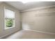 Walk-in closet featuring wire rack shelving and window at 1459 Hickory Branch Nw Trl, Kennesaw, GA 30152