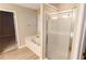 Bright bathroom with a garden tub and shower at 4208 Royal Regency Nw Cir # 9, Kennesaw, GA 30144