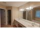 Bathroom featuring a double vanity, soaking tub, and a separate shower enclosure at 4208 Royal Regency Nw Cir # 9, Kennesaw, GA 30144