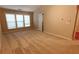 Spacious bedroom with carpet, large windows allowing ample natural light, and a ceiling fan at 4208 Royal Regency Nw Cir # 9, Kennesaw, GA 30144