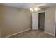 An airy bedroom with a ceiling fan and a closet at 4208 Royal Regency Nw Cir # 9, Kennesaw, GA 30144