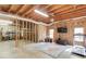 Unfinished basement featuring exposed ceiling, framing, and recreational area with ping pong table at 445 Big Bend Trl, Sugar Hill, GA 30518