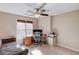 Bedroom or study area with a desk, ergonomic chair, and natural light at 445 Big Bend Trl, Sugar Hill, GA 30518