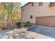 A two-car garage and driveway behind this home at 445 Big Bend Trl, Sugar Hill, GA 30518