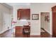 Hallway nook with built-in desk and storage cabinets at 445 Big Bend Trl, Sugar Hill, GA 30518