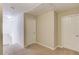 Hallway featuring carpet flooring and neutral paint at 445 Big Bend Trl, Sugar Hill, GA 30518