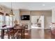 Kitchen with dining area and adjoining living room at 445 Big Bend Trl, Sugar Hill, GA 30518