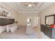 Spacious main bedroom features a trey ceiling, neutral walls, and plenty of natural light at 445 Big Bend Trl, Sugar Hill, GA 30518