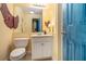 Well-lit bathroom with vanity, mirror, toilet, and unique brick accents on the wall at 639 Puckett Se Rd, Emerson, GA 30137