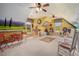 Bright bedroom with toys, rocking chairs, and scenic mural wall at 639 Puckett Se Rd, Emerson, GA 30137
