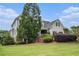 View of the home's exterior, showcasing the well-maintained yard and architecture at 639 Puckett Se Rd, Emerson, GA 30137