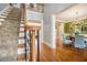 Inviting foyer with staircase, hardwood floors, and elegant architectural details at 639 Puckett Se Rd, Emerson, GA 30137