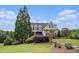Charming home featuring a well-manicured lawn and lush landscaping at 639 Puckett Se Rd, Emerson, GA 30137