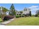Picture of a beautiful home exterior with green grass and manicured bushes at 639 Puckett Se Rd, Emerson, GA 30137