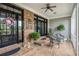 Cozy front porch with brick flooring, comfortable seating, and inviting decor at 639 Puckett Se Rd, Emerson, GA 30137