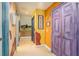 Hallway features colorful murals, decorative brick accents, and unique painted doors at 639 Puckett Se Rd, Emerson, GA 30137