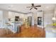 Modern kitchen with stainless steel appliances, granite countertops, white cabinetry, and breakfast bar seating at 639 Puckett Se Rd, Emerson, GA 30137