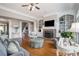 Bright living room with hardwood floors, fireplace, built-in shelving, and a comfortable seating arrangement at 639 Puckett Se Rd, Emerson, GA 30137