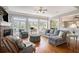 Bright living room with fireplace, French doors, and comfortable seating at 639 Puckett Se Rd, Emerson, GA 30137
