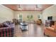 Spacious living room with hardwood floors, French doors, and comfortable seating at 639 Puckett Se Rd, Emerson, GA 30137