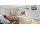 Cozy finished basement with a brick fireplace, creating a warm and inviting space for relaxation and entertainment at 10 Wyndham Dr, Sandy Springs, GA 30328