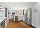 Kitchen featuring stainless steel appliances, hardwood floors, and a wine cooler at 10 Wyndham Dr, Sandy Springs, GA 30328
