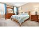 Comfortable bedroom featuring neutral colors, natural light, and carpet, making it cozy and inviting at 110 Apple Blossom Ln, Fayetteville, GA 30215