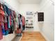 Spacious walk-in closet with ample shelving and hanging space is perfect for organization and storage at 110 Apple Blossom Ln, Fayetteville, GA 30215