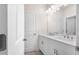 Modern bathroom featuring double sinks, a large mirror, and ample counter space at 146 Birch Tree Way, Cumming, GA 30040
