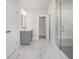 Bathroom with gray vanity, modern fixtures, and a glass-enclosed shower at 146 Birch Tree Way, Cumming, GA 30040