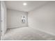 Comfortable bedroom with carpet flooring and a window for natural light at 146 Birch Tree Way, Cumming, GA 30040