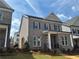 Attractive brick and siding two-story home with manicured lawn, inviting curb appeal at 146 Birch Tree Way, Cumming, GA 30040