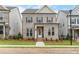 Charming two-story brick home with a well-manicured lawn and classic architectural details at 146 Birch Tree Way, Cumming, GA 30040