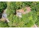 An aerial view showcasing the property's location and lush, mature tree surroundings at 160 Wentworth Dr, Canton, GA 30114