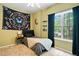 Bedroom features modern decor and a large window, creating a serene and stylish retreat at 160 Wentworth Dr, Canton, GA 30114