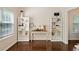 Cozy living room with hardwood floors, bookshelves, and natural light at 160 Wentworth Dr, Canton, GA 30114