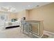 Finished basement area featuring a bar, bed, and bright natural light from the walkout entrance at 160 Wentworth Dr, Canton, GA 30114