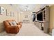 Spacious recreation room with plush carpeting, comfortable seating, and entertainment center at 160 Wentworth Dr, Canton, GA 30114