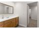 Bathroom featuring wooden cabinets and drawers, a sink and a mirror at 1900 Chattahoochee Run Dr, Suwanee, GA 30024