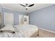 Relaxing bedroom with a large bed and view to the doorways at 1900 Chattahoochee Run Dr, Suwanee, GA 30024