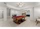 Spacious game room featuring a pool table and an open layout connecting to a kitchenette area at 1900 Chattahoochee Run Dr, Suwanee, GA 30024