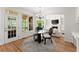 Cozy kitchen nook area with natural lighting and access to outdoor deck at 1900 Chattahoochee Run Dr, Suwanee, GA 30024