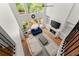 Aerial view of the well-lit living room, showing modern furnishings and high ceilings at 1900 Chattahoochee Run Dr, Suwanee, GA 30024