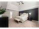 Spacious main bedroom with large bed, tray ceiling, ceiling fan, and neutral decor at 1900 Chattahoochee Run Dr, Suwanee, GA 30024