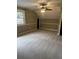 Spacious bedroom with a vaulted ceiling, neutral walls, and plush carpet at 370 Buchanan Circle Tract 1, Dallas, GA 30157