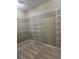Walk-in closet with ample shelving and storage space, ready for organization at 370 Buchanan Circle Tract 1, Dallas, GA 30157